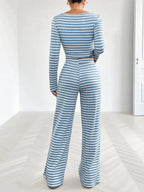 Women's striped square neck long sleeve loungewear set with matching pants, soft and stylish two-piece from Trendsi.