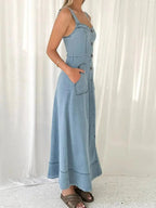 Women's sweetheart neck denim dress with pockets, casual blue jean style by Trendsi, perfect for everyday wear.