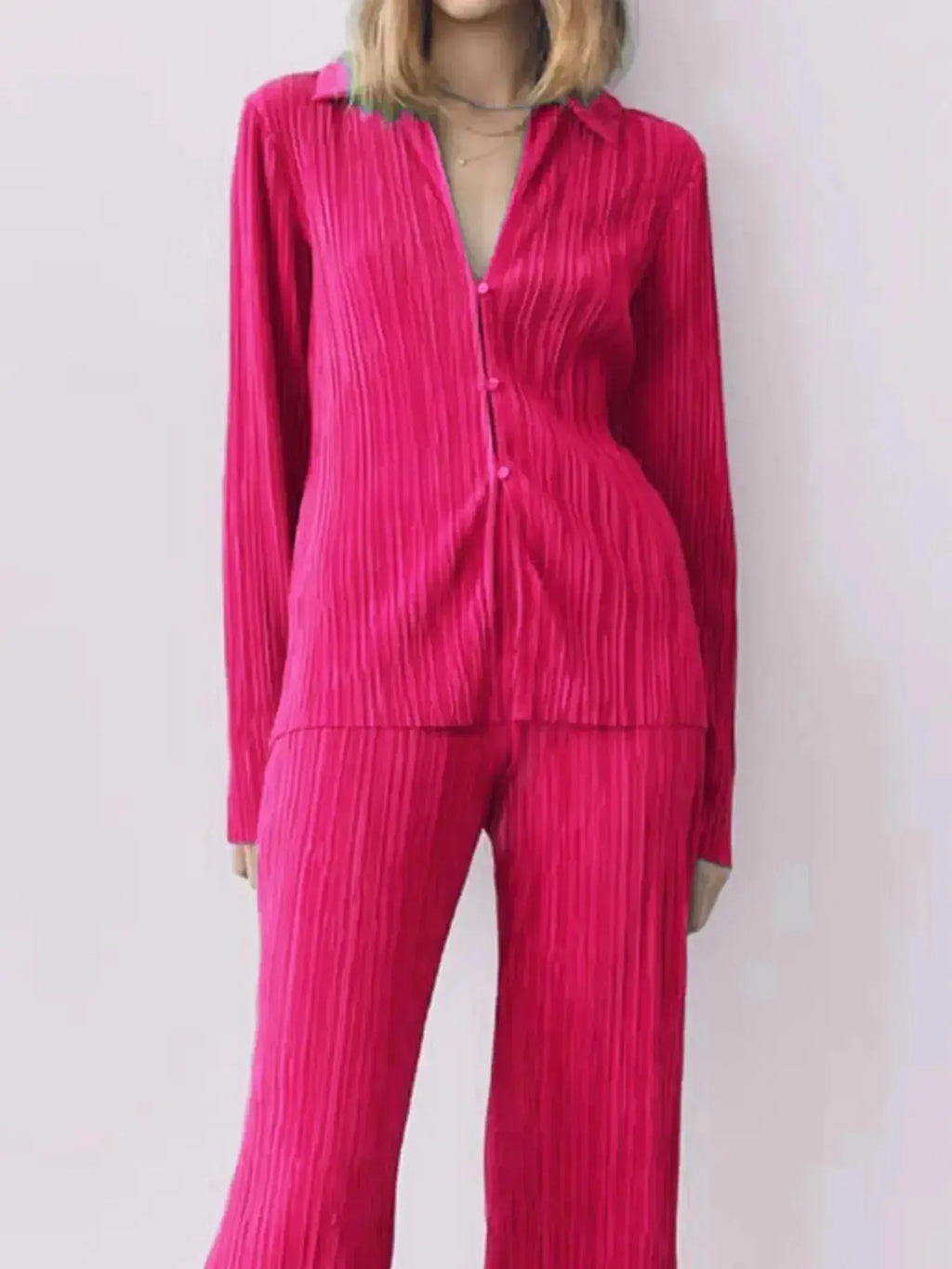 Women's textured long sleeve pajama lounge set with cozy button-up top and matching pants, stylish and comfortable sleepwear.