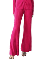 Women's textured long sleeve lounge set by Trendsi, cozy button-up pajama two-piece with soft fabric and relaxed fit.