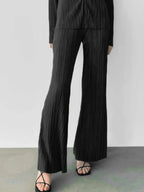 Women’s textured long sleeve lounge set with cozy button-up pajamas, two-piece comfortable pajama set by Trendsi.