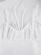 Women's tie-front cami and shorts loungewear set by Trendsi, soft stretch pajama set with comfortable, relaxed fit.