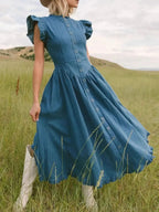 Women’s tiered ruffled cap sleeve denim dress, casual midi summer dress by Trendsi, featuring a relaxed fit and stylish ruffle details.
