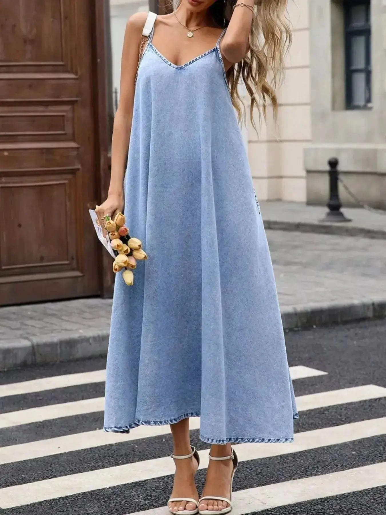 Women’s V-neck denim cami mini dress by Trendsi, casual sleeveless cotton blend dress with a relaxed fit and stylish V-neck design.