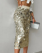 Women’s high-waisted solid sequin umbrella skirt by Plush Fashion Hub, featuring a shimmering evening-ready design.