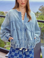 Women's vintage washed denim zip-up jacket with structured cotton blend, casual and stylish outerwear by Trendsi.