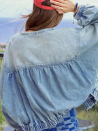 Women’s vintage washed zip-up denim jacket by Trendsi, structured cotton blend with classic style and detailed stitching.