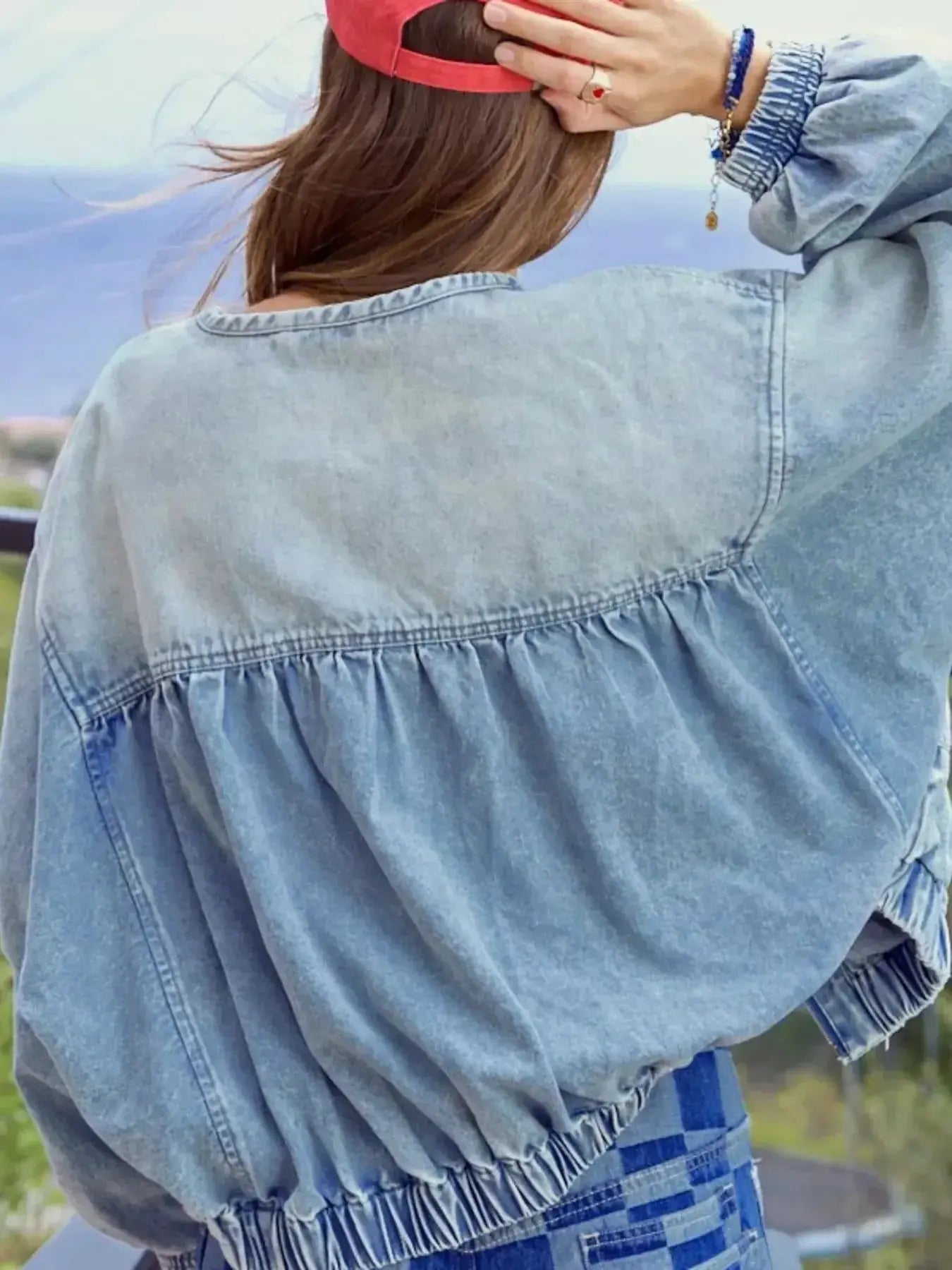 Women’s vintage washed zip-up denim jacket by Trendsi, structured cotton blend with classic style and detailed stitching.