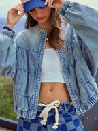 Women’s vintage washed denim zip-up jacket with structured cotton blend, featuring classic denim styling and a fitted silhouette.