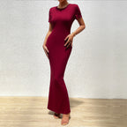 Women’s slim fit round neck dress in a solid color by Trendy Attic Store01, showcasing a stylish and elegant silhouette.