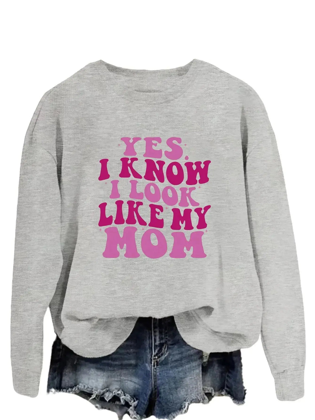 Plush Fashion Hub graphic sweatshirt with "Yes I Know I Look Like My Mom" print, cozy pullover in soft fabric.