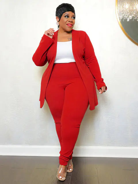 Plus size women's matching two-piece outfit set by Trendy Attic Store01, featuring a stylish top and matching pants.