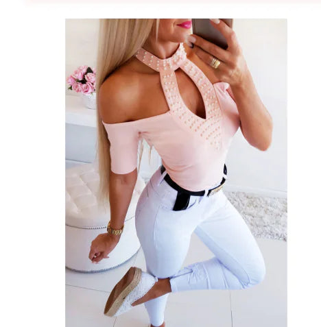 Women’s short sleeve off-shoulder top from Trendy Attic Store01, featuring a stylish design and relaxed fit.
