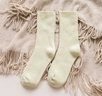 Thick cotton women's thermal socks for autumn and winter, cozy and warm, in a neutral color, designed for cold weather comfort.