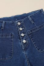 Threaded Pear Mckinley wide leg cropped jeans displayed on a model, showcasing relaxed fit and stylish denim design.