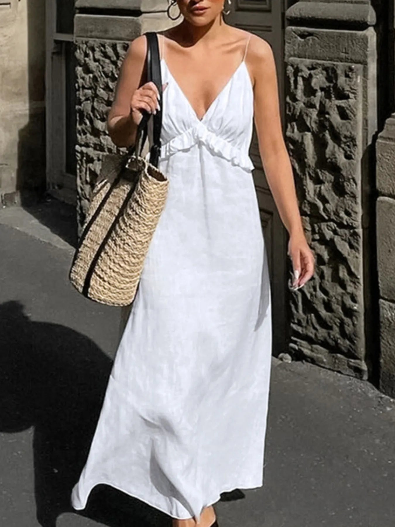 Women's ruffled V-neck cotton maxi dress with flowing boho style and summer design, featuring ruffle details and a relaxed fit.