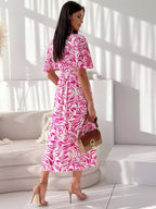 Printed flutter sleeve midi dress by Shopimist featuring a flowy design, vibrant pattern, and elegant silhouette.