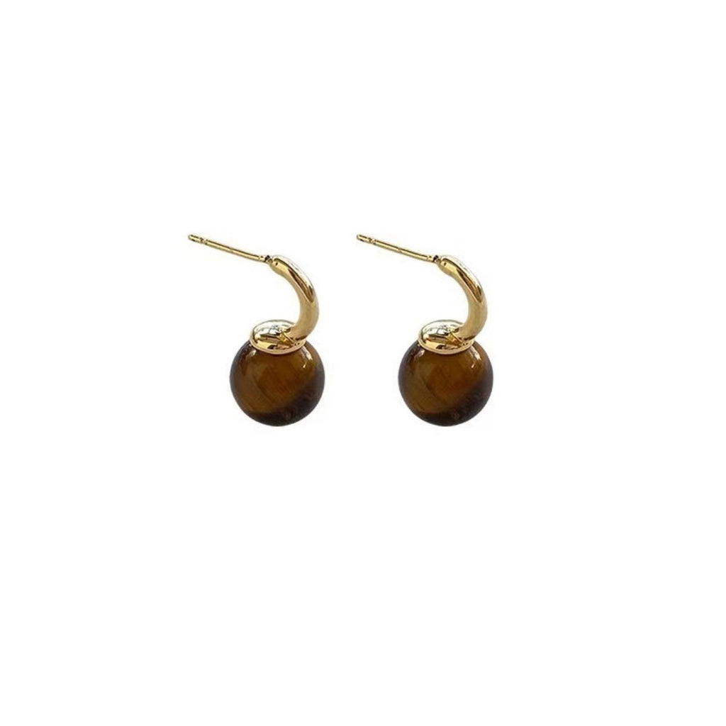 Shopimist Tiger Eye ball drop earrings featuring smooth, polished tiger eye gemstone beads hanging from delicate metal hooks.
