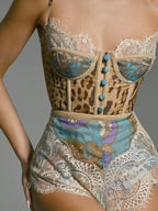 Leopard print lace trim romper jumpsuit by Trendsi featuring a fitted silhouette and stylish design.