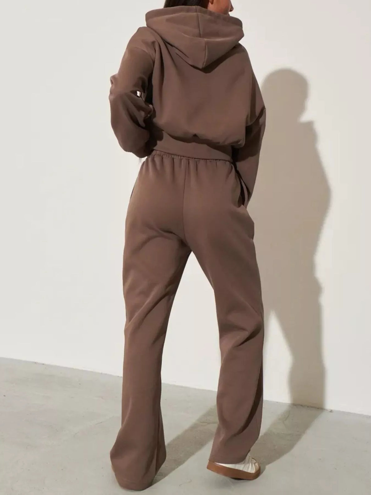 Plush Fashion Hub zip-up hoodie and wide-leg pants loungewear set, featuring a comfortable fit and casual style in soft fabric.
