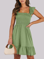 Women's smocked ruffle hem mini dress by Trendsi, lightweight casual summer dress with a flowy ruffle hem and smocked bodice.