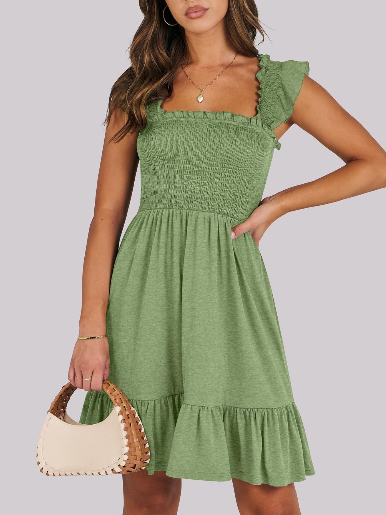Women's smocked ruffle hem mini dress by Trendsi, lightweight casual summer dress with a flowy ruffle hem and smocked bodice.