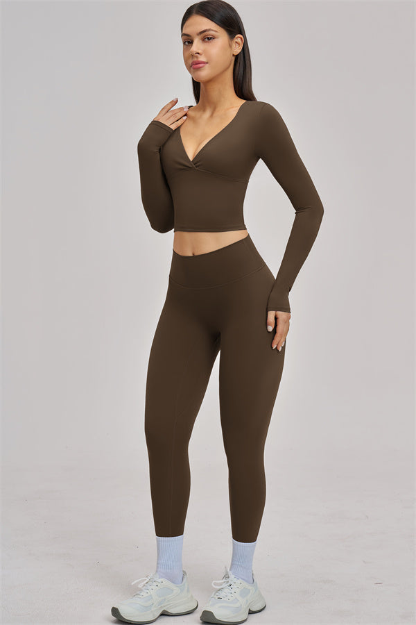 Fitglutes Activewear long sleeve crop top with fitted design, in a stylish color, ideal for gym and workout activities.
