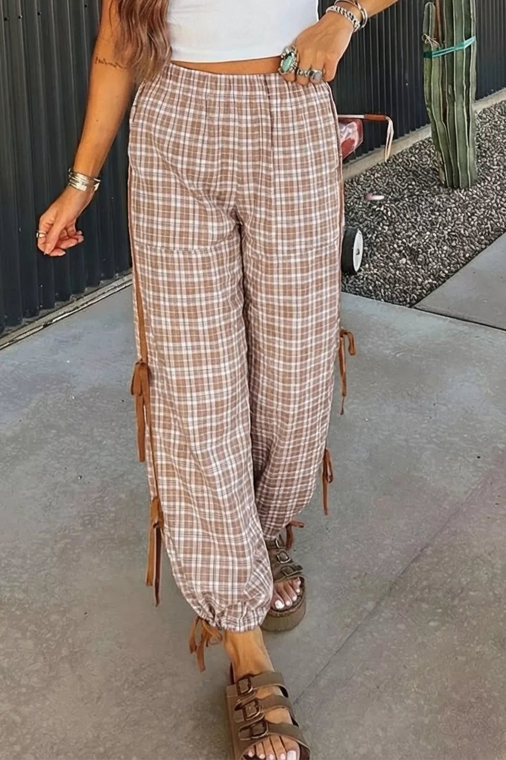 Plaid print casual pants with tie detail from Plush Fashion Hub, featuring a relaxed fit and stylish design.