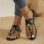 Women's open toe low heel sandals by Trendsi with gold accent detail, showcasing stylish footwear with a comfortable heel height.