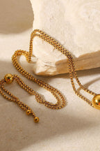 18K gold-plated round pendant necklace from Shopimist with a sleek, polished design on a delicate chain.