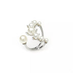 Silver alloy open ring with pearl accent, stylish jewelry accessory showing the ring's design and details.