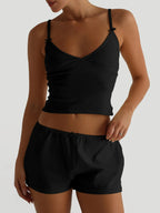 Trendsi V-neck cami and shorts activewear set in lightweight fabric, featuring a V-neck top and matching shorts for comfortable workout attire.