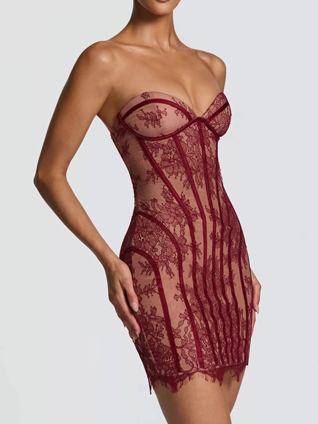 Lace detail tube mini dress from Trendsi featuring a fitted silhouette and stylish design, perfect for casual or evening wear.