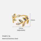 18K gold-plated resin leaf bypass ring with a sleek, modern design, featuring detailed leaf motifs and smooth gold finish.