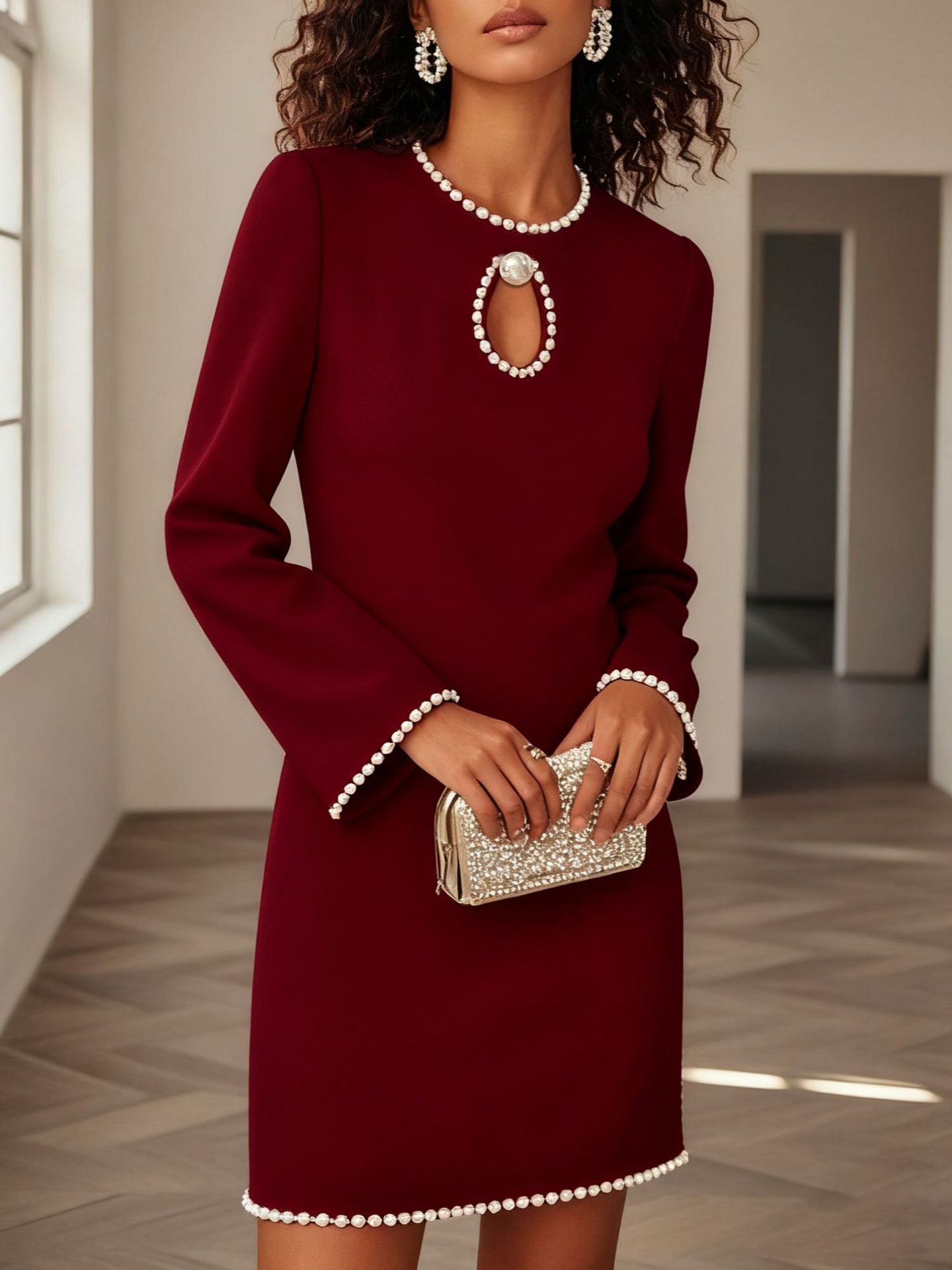 Elegant keyhole pearl trim mini dress by Trendsi featuring a chic design, perfect for cocktail parties and evening wear.