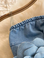 Strapless denim dress with floral appliqué details, showcasing a trendy, casual dress style by Trendsi.