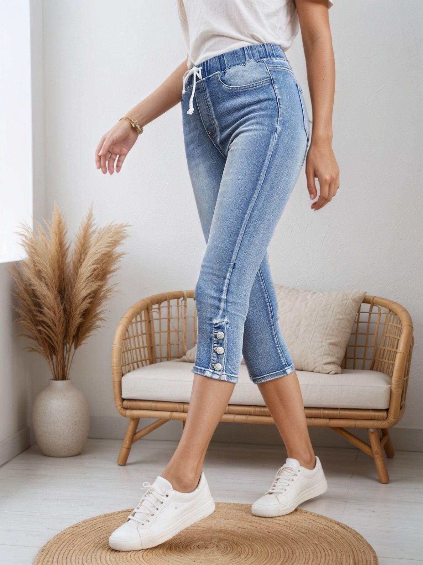 Women’s casual denim shorts with drawstring waist from FitiqueFit, featuring a relaxed fit and classic blue denim fabric.