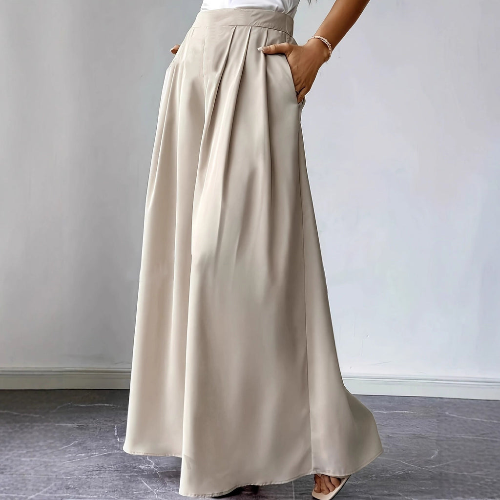 Women's high-waist pleated wide-leg linen pants by FitiqueFit, relaxed bohemian casualwear in a natural linen fabric.