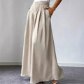 Women's high-waist pleated wide-leg linen pants in relaxed bohemian style, casualwear from FitiqueFit.