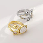 Irregular pearl open ring by Shopimist featuring a unique, organic-shaped pearl on a sleek open band design.