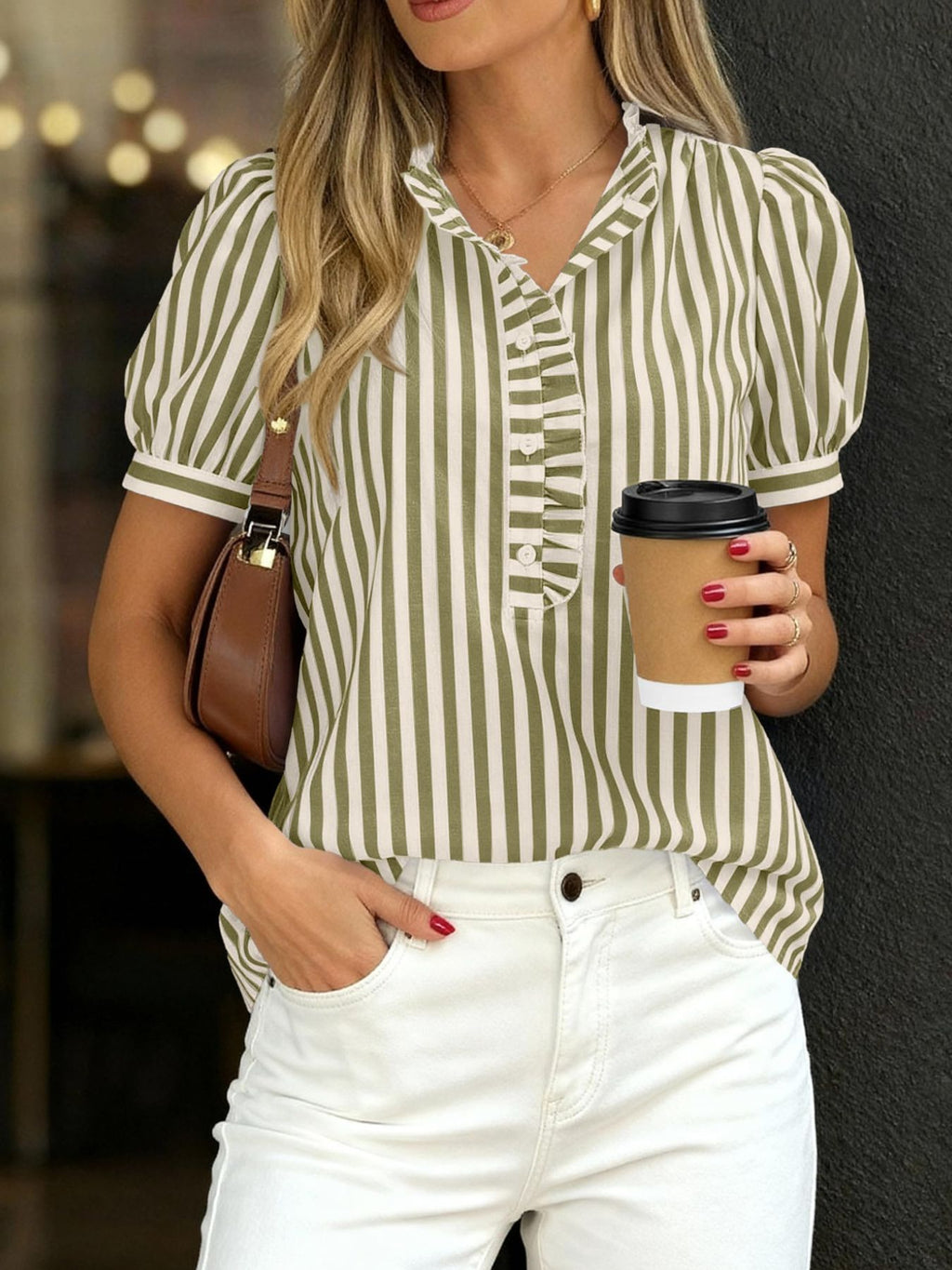 Women's striped puff sleeve blouse with ruffled details, featuring a stylish and feminine design from Trendsi.