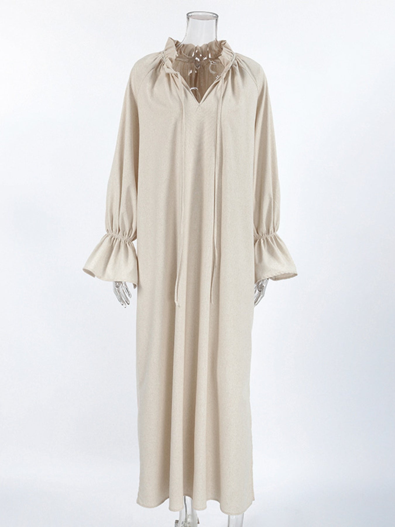 Cotton linen maxi dress with tie neck and flounce sleeves, Trendsi fashion, featuring a flowy silhouette and stylish design.