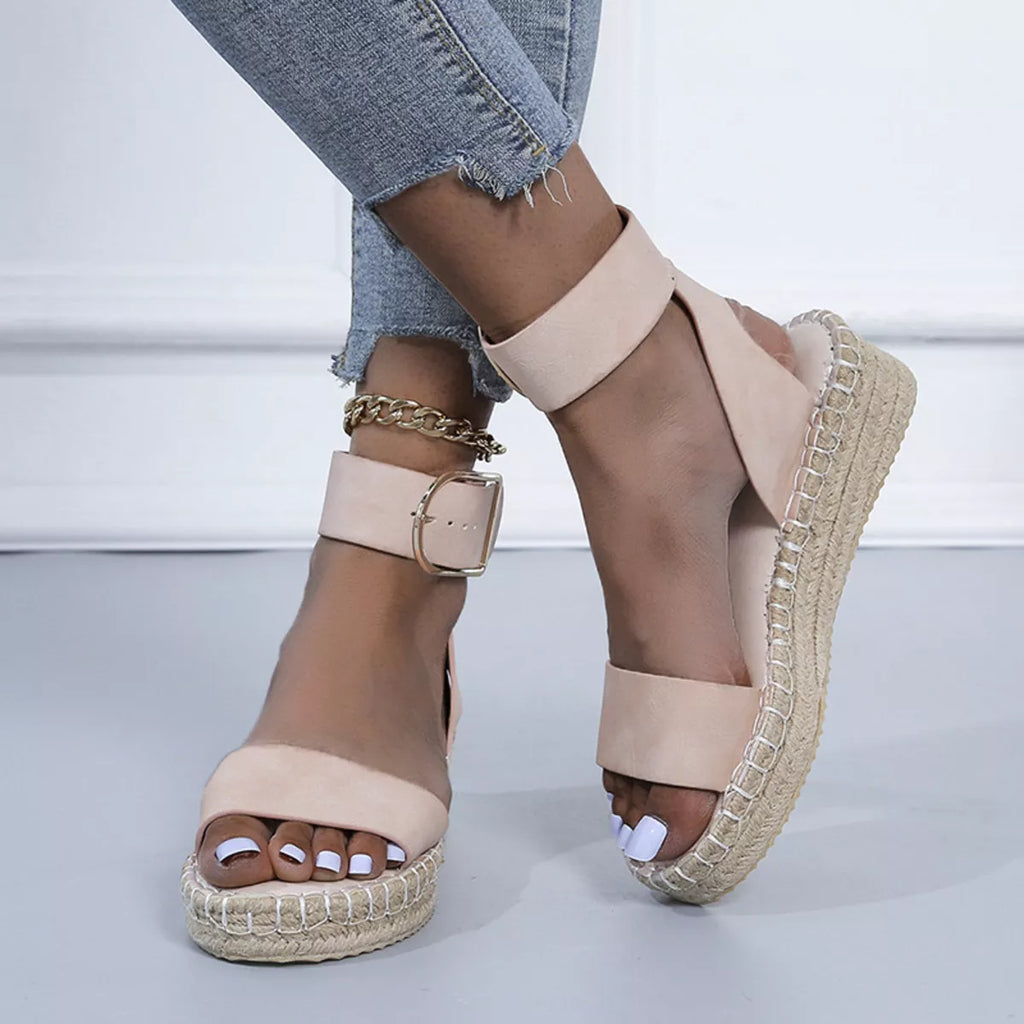 Open toe openwork sandals by Shopimist featuring stylish cutout design and comfortable flat sole.