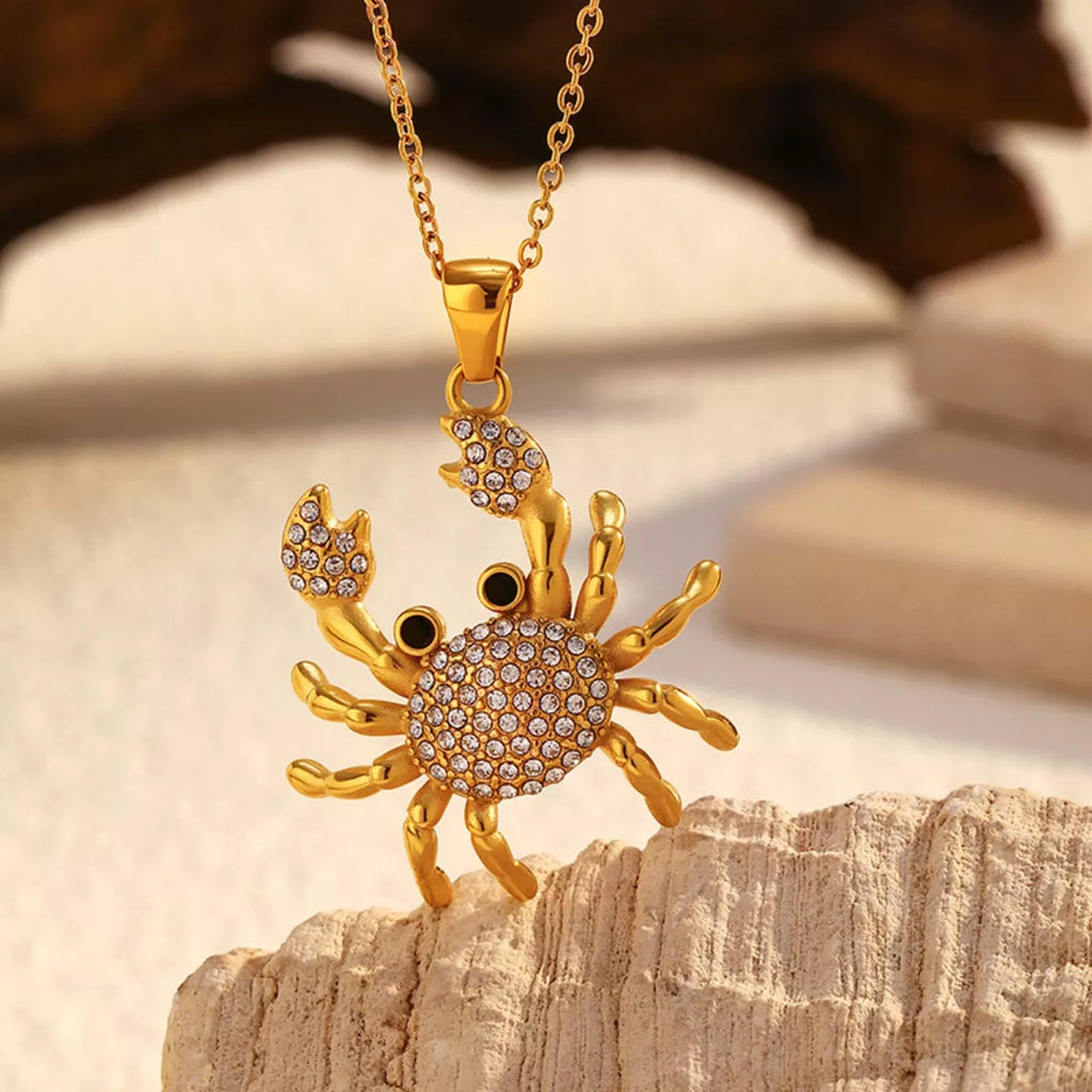 18K gold-plated crab pendant necklace with detailed crab design and chain, showcasing elegant jewelry craftsmanship.