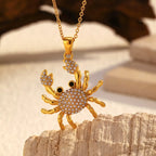 18K gold-plated crab pendant necklace with detailed crab design and chain, showcasing elegant jewelry craftsmanship.