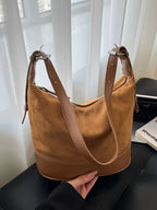 Shopimist adjustable strap tote bag featuring a spacious design and durable handles, ideal for everyday use.