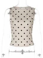 Polka dot tank top by Shopimist, featuring a sleeveless design with a playful polka dot pattern, casual summer fashion.