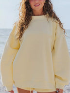 Plush Fashion Hub relaxed fit round neck sweatshirt and shorts set, casual 2-piece loungewear in soft fabric, perfect for comfort.