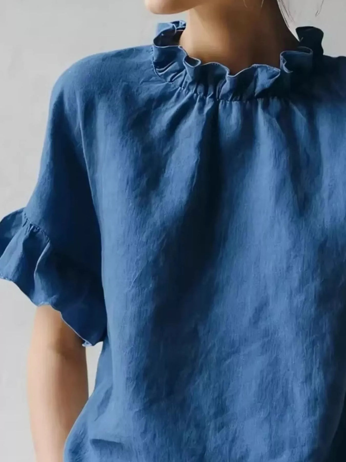 Plus size ruffled neck half sleeve blouse by Plush Fashion Hub, featuring a stylish ruffled collar and full coverage design.
