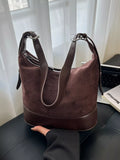 Adjustable strap tote bag by Shopimist featuring durable material and spacious interior, perfect for daily use and versatile styling.